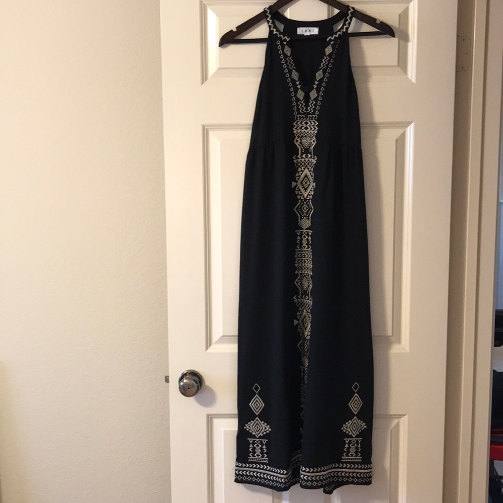 Black dress with tan stitching